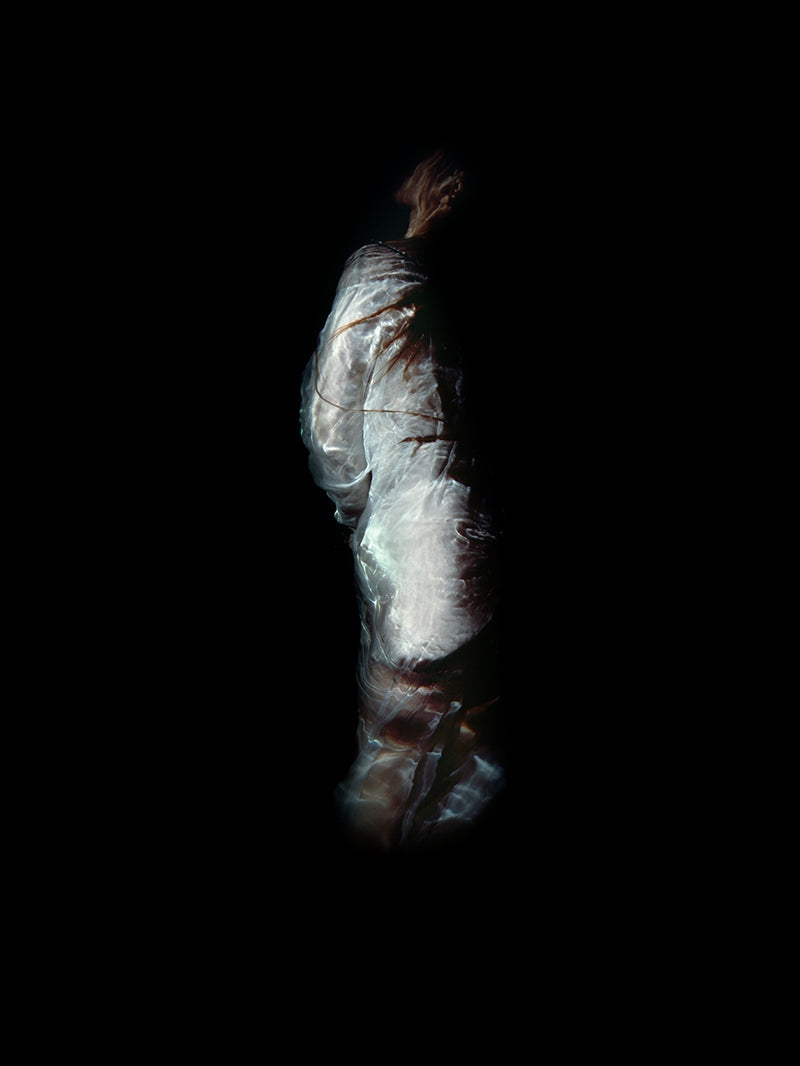 scream-a-surreal-figurative-image-of-a-woman-screaming-underwater