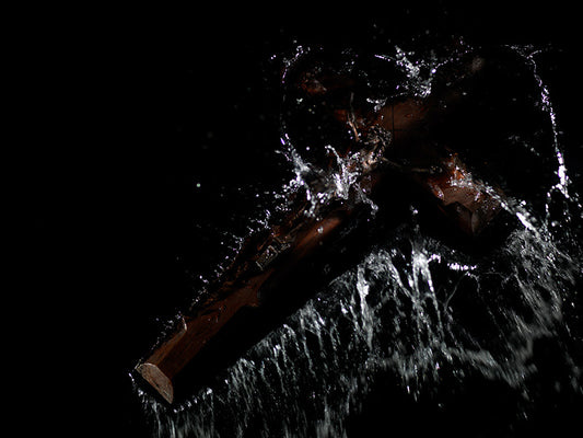Splash Crucifixion Crucifix breaks the surface tension of the waters surface