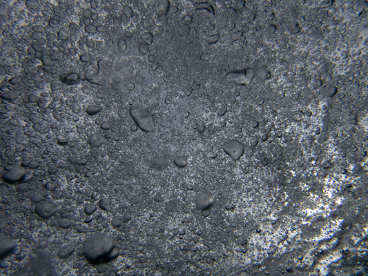The Subtle Elegance of Underwater Bubble Patterns Captured On Film