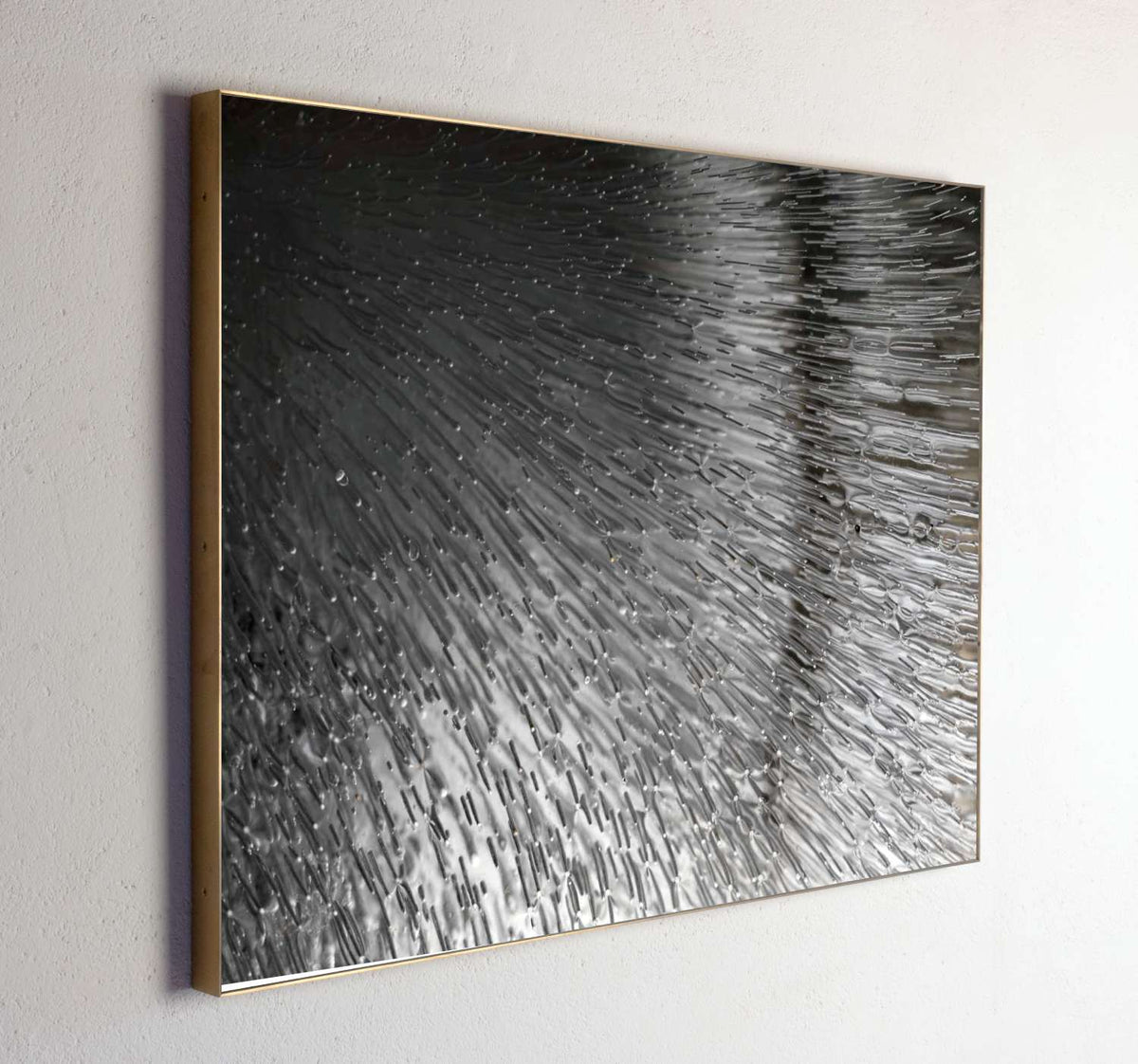 Left side view of Eudoxus of Cnidus, analogue photograph exploring oil, water and light by Alexander James Hamilton
