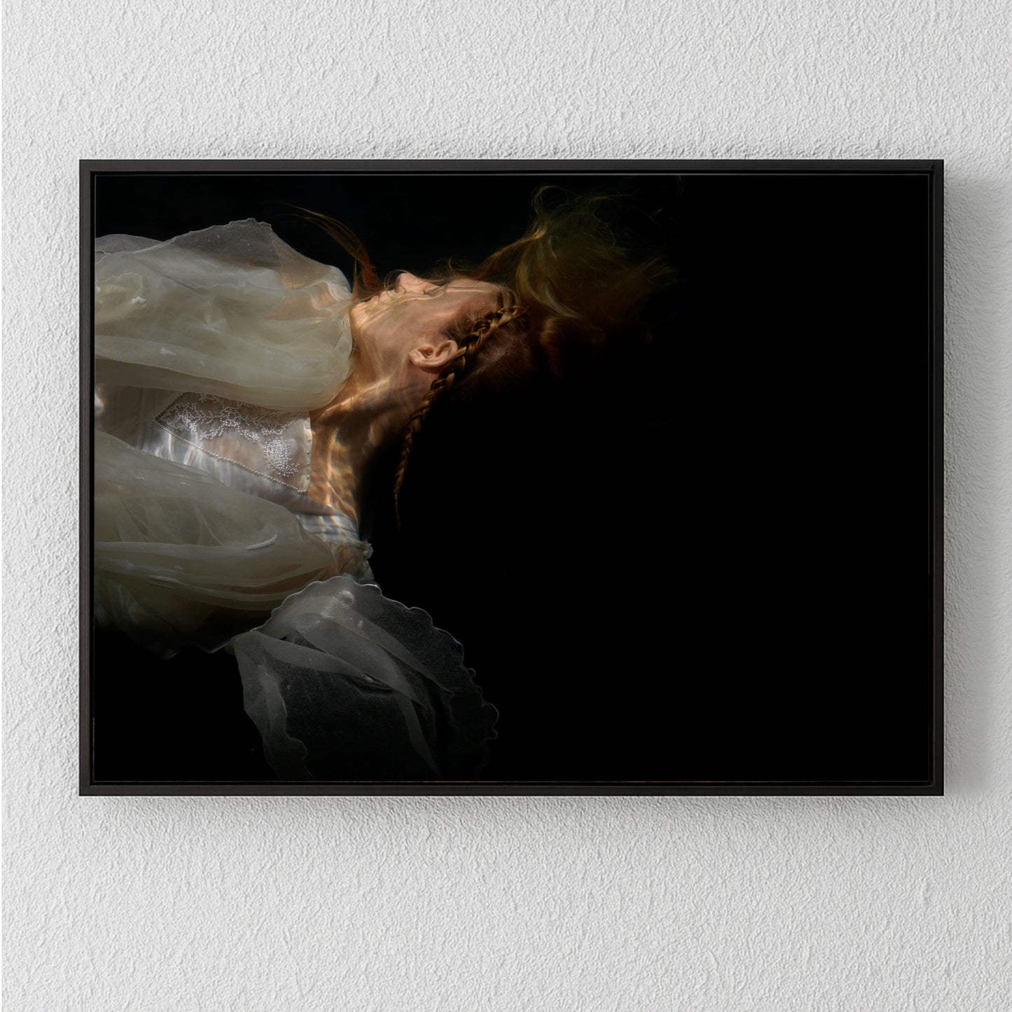 Ophelia Plate 0124 featuring a unique archival pigment print of a soft-lit figure in translucent fabric against a dark.