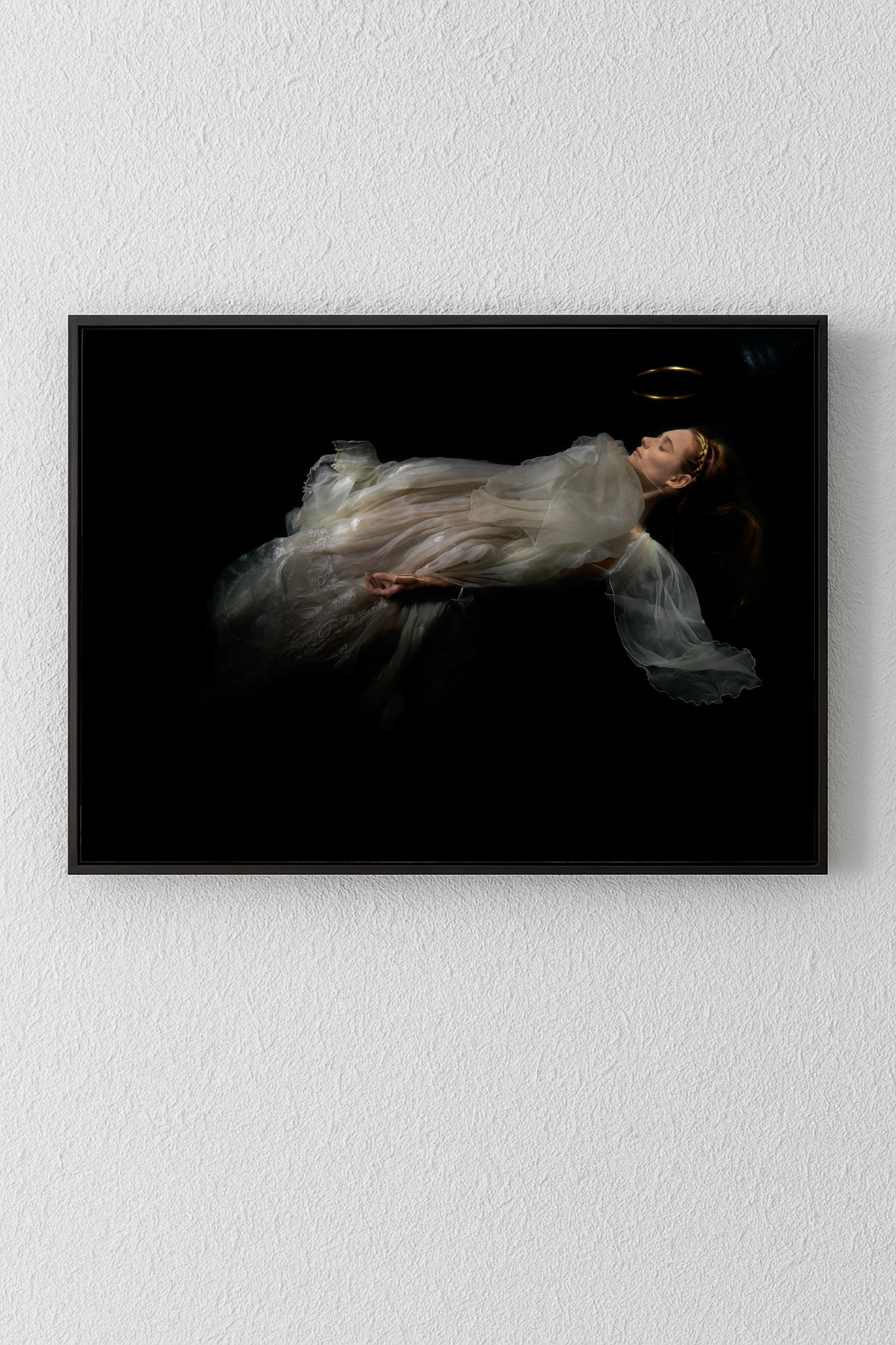 Unique archival pigment print featuring a floating woman in a flowing white dress on black background.
