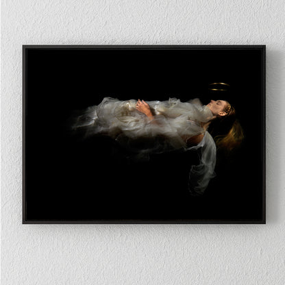 Unique archival pigment print of a woman in flowing white fabric floating against a black background.