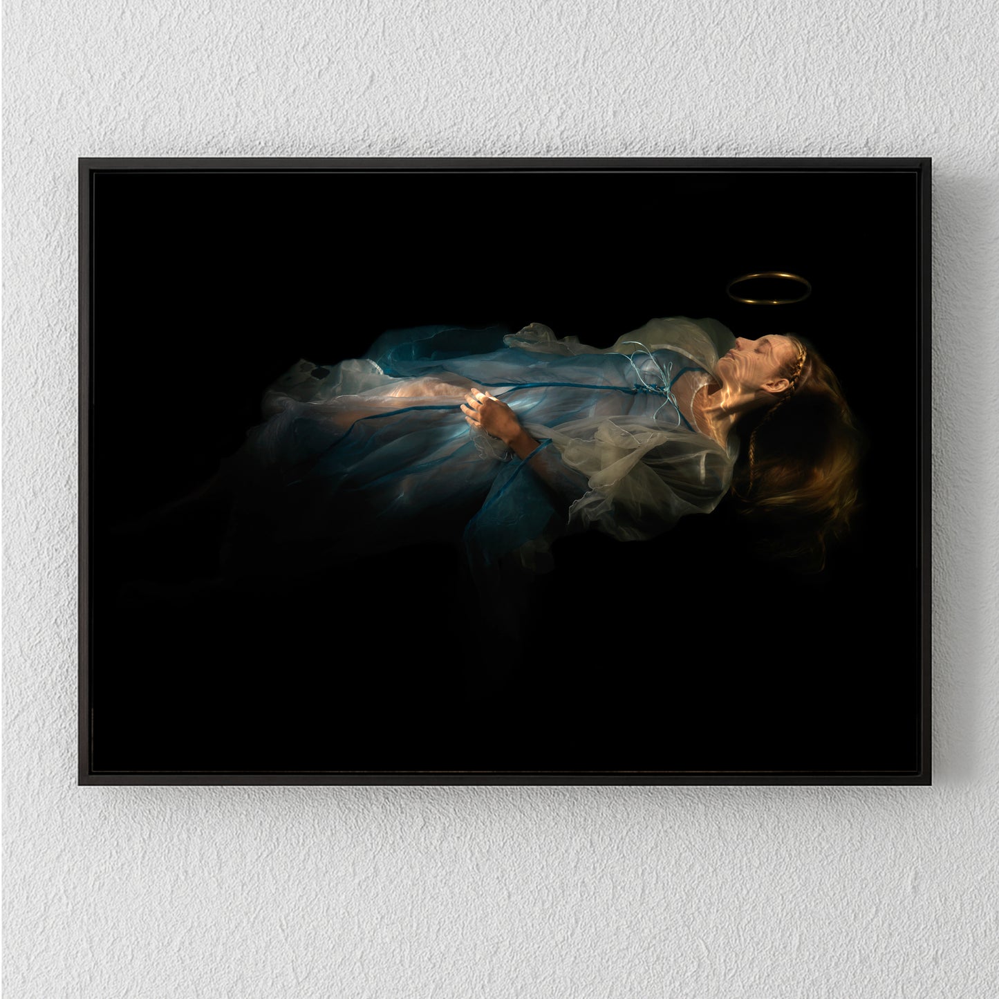 Unique archival pigment print of a woman in a flowing blue dress against a black background.