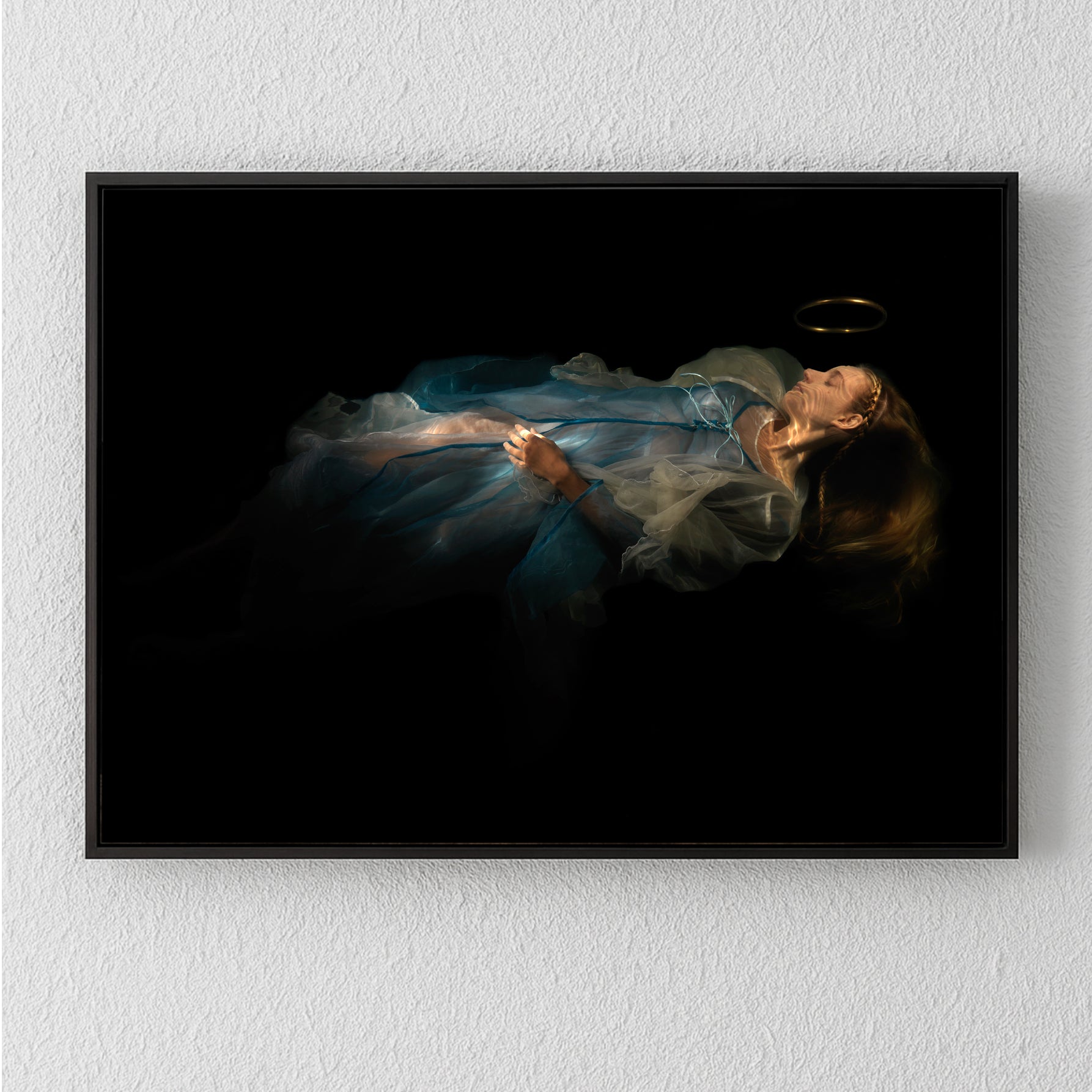Unique archival pigment print of a woman in a flowing blue dress against a black background.