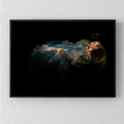 Unique archival pigment print of a woman in a flowing blue dress against a black background.