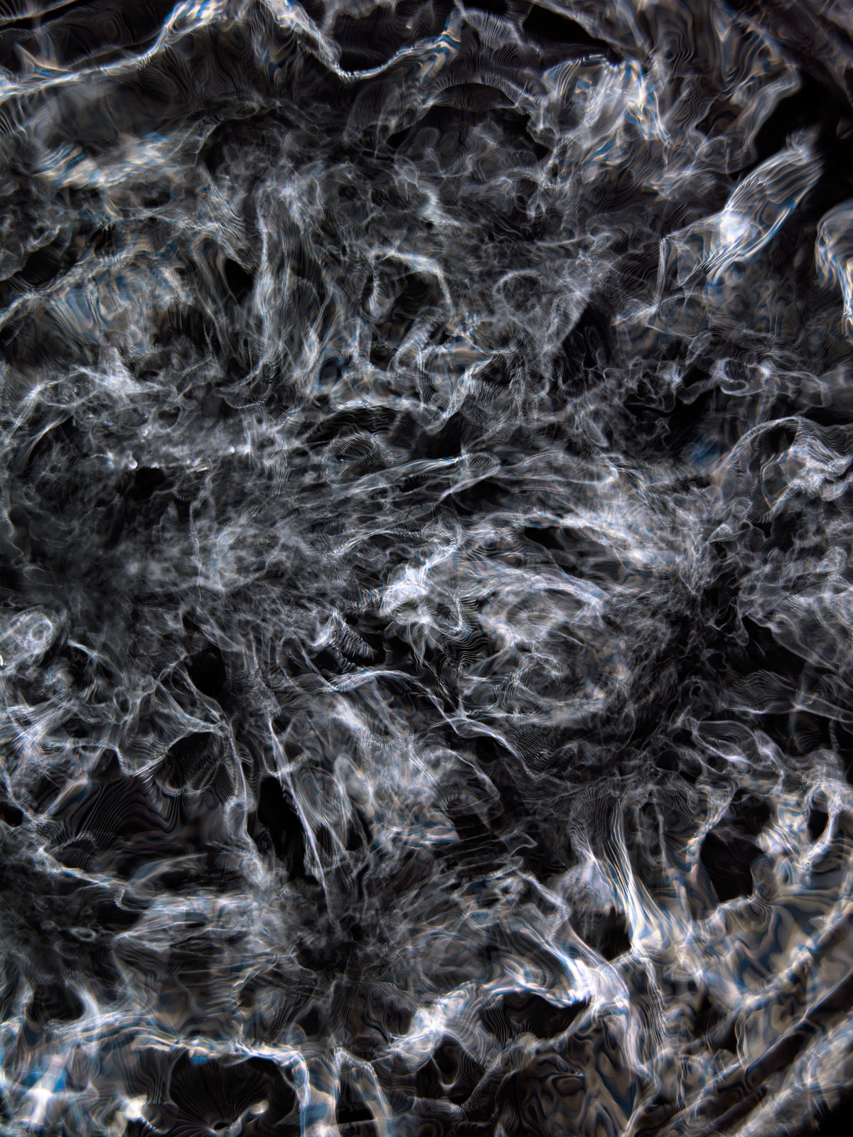 Detail of Cymatic Plate 0262 showing fluid light patterns formed through resonance in water, analogue photograph by Alexander James Hamilton