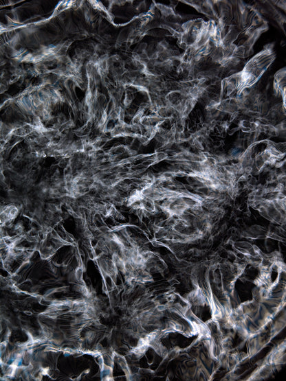 Detail of Cymatic Plate 0262 showing fluid light patterns formed through resonance in water, analogue photograph by Alexander James Hamilton