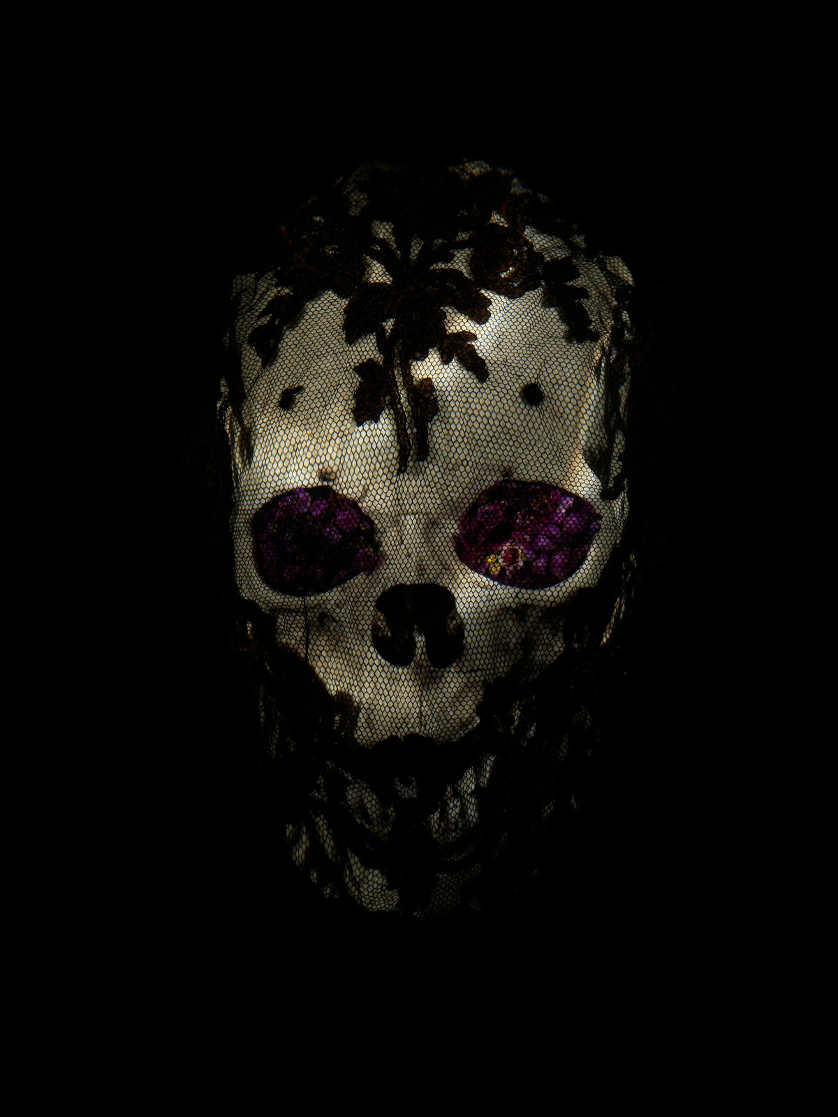 Veiled skull with flowers detail by Alexander James Hamilton, analogue photograph produced through water and light