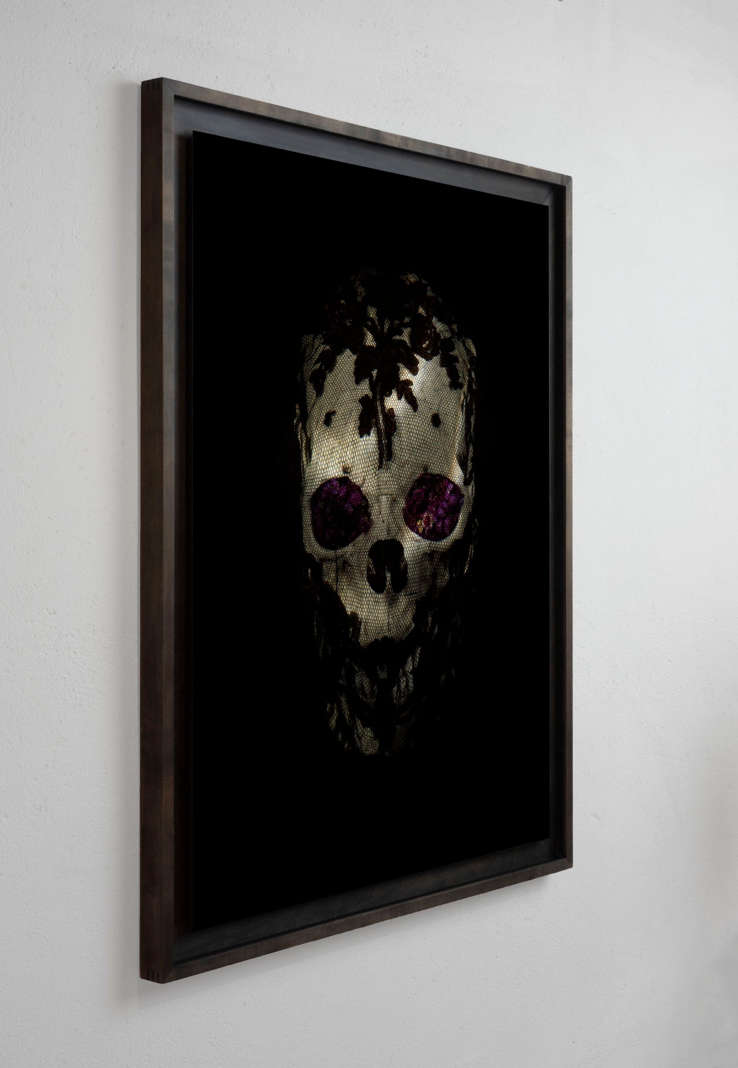Veiled skull with flowers installation view by Alexander James Hamilton, analogue photograph produced through water and light