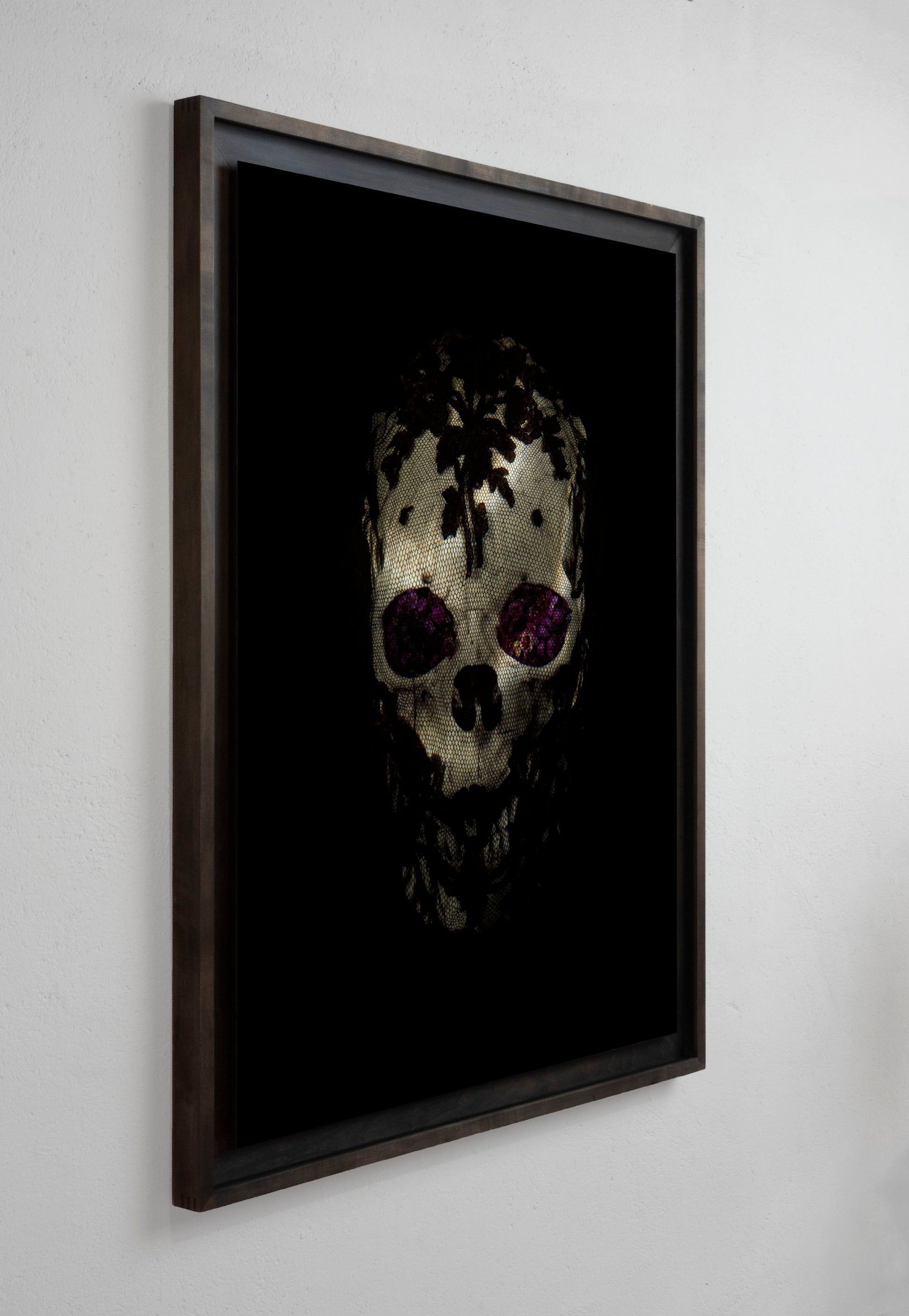 Veiled skull with flowers installation view by Alexander James Hamilton, analogue photograph produced through water and light